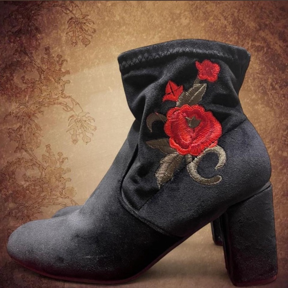 Black suede ankle boots with red rose embroidery with a velvet material.